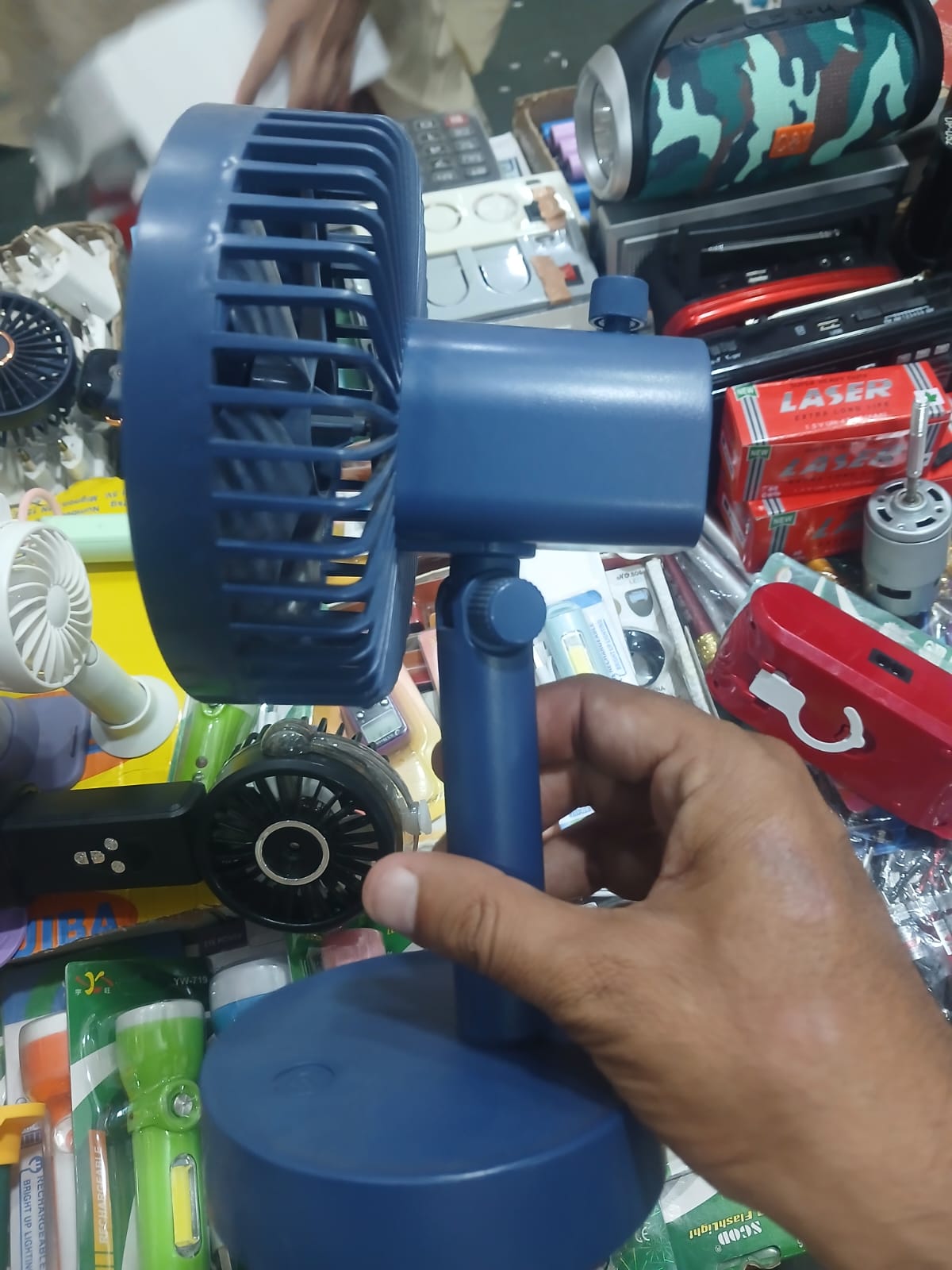 Rotatable Telescopic Portable Fan – Cell Operated, Adjustable Cooling Companion